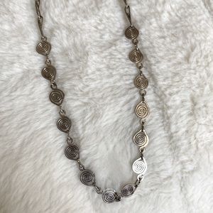 Silver swirls design necklace